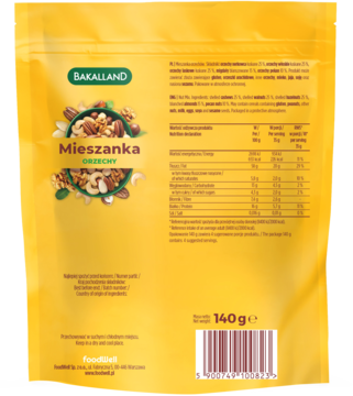 Tył żółtego opakowania Bakalland Mieszanka Orzechów z tabelą wartości odżywczych i kodem kreskowym.