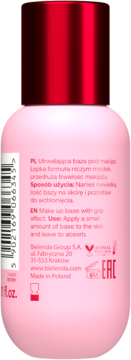 Tył różowej butelki utrwalającej bazy pod makijaż Bielenda z czerwoną nakrętką, widoczne opisy po polsku i angielsku.