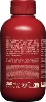 Tył czerwonej butelki szamponu z kompleksem ceramidów i alg. Widoczne szczegóły etykiety i skład 250ml.