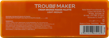 Tył pomarańczowego opakowania palety Trouble Maker Cream Bronze Maker Light Medium, z białym tekstem i kodem kreskowym.