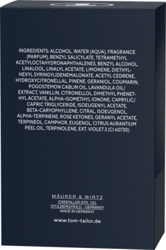 Tył ciemnego pudełka perfum Tom Tailor Essence of Power z białą listą składników i adresem producenta.