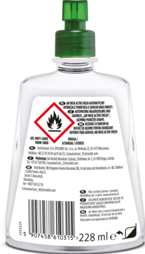 Tył białej butelki Air Wick Active Fresh z zieloną pompką, widoczna etykieta ostrzegawcza i kod kreskowy.