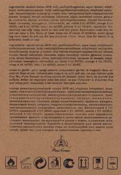 Tył opakowania perfum Warm Leather, jasnobrązowe z tekstem składników i symbolami ostrzegawczymi.