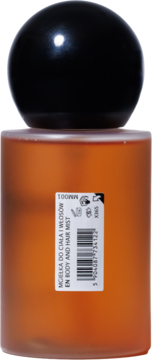 Mgiełka do ciała i włosów w bursztynowej butelce z czarną kulistą nakrętką, tył z etykietą, brzoskwinia i koniak.