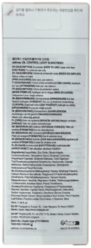 Tył białego opakowania kremu przeciwsłonecznego NATUREMAX OIL CONTROL LIGHT SUNSCREEN SPF 50+. Widoczne opisy i lista składników.