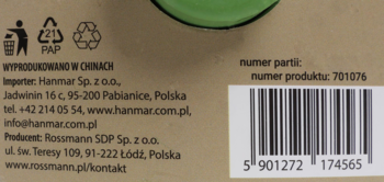 Tył brązowego kartonowego opakowania szczotki Eloy z danymi importera, producenta Rossmann, kodem kreskowym i numerem produktu 701076.