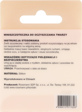 Tył beżowego opakowania mini szczoteczki do oczyszczania twarzy Rossmann. Widoczne instrukcje i kod kreskowy.