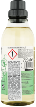 Tył butelki niemieckiego płynu do prania Frosch 720ml, z żółtym płynem, etykieta z ostrzeżeniem i składem.