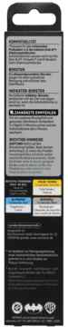 Tył opakowania wymiennych końcówek Oral-B Batman, ciemne tło z niemieckimi instrukcjami i logotypami.
