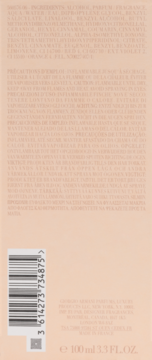 Tył beżowego opakowania perfum z kodem kreskowym, listą składników i ostrzeżeniami w wielu językach.