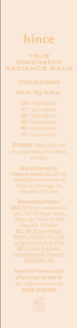 Tył opakowania Hince True Dimension Radiance Balm LT003 Gleaming, rozświetlacz, beżowe z pomarańczowym tekstem.
