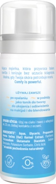Tył białej butelki mgiełki do twarzy i ciała. Niebieska etykieta z opisem, składnikami (m.in. owies) i 0% zapachu.