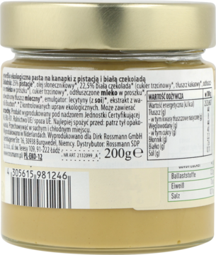 Ekologiczna pasta pistacjowo-czekoladowa Rossmann 200g. Tył szklanego słoika z etykietą, składem, kodem.