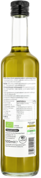 Tył butelki oliwy z oliwek z pierwszego tłoczenia 500ml, przezroczyste szkło, zielono-żółty płyn, biała etykieta z tekstem.