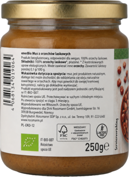 Tył szklanego słoika musu z orzechów laskowych enerBiO 250g, z zieloną etykietą i certyfikatami BIO.