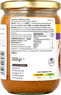 Tył opakowania ciemnej pasty migdałowej 500g Rossmann, z etykietą ze składem i danymi żywieniowymi.
