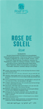 Tył turkusowego opakowania perfum RiiffS Rose De Soleil Eclat, z listą składników i ostrzeżeniami.
