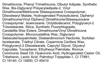 Lista składników kosmetyku kolorowego, w tym woski i barwniki, czarny tekst na białym tle.