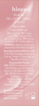 Różowa etykieta tintu hince RAW GLOW GEL TINT R011 CHAI. Biały tekst: nazwa, objętość, producent i ostrzeżenia.