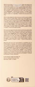 Tył opakowania toniku z Centella Asiatica i pantenolem. Beżowa butelka z tekstem w kilku językach i symbolami recyklingu.