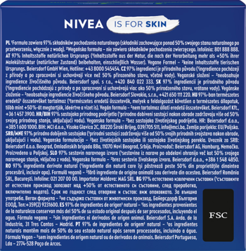 Tył opakowania NIVEA w ciemnoniebieskim kolorze z białym tekstem, zbliżenie na składniki produktu.