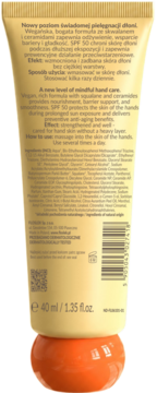 Tył beżowej tubki kremu FlosLek Hand Screen Age Defence SPF 50, 40ml, ze składem i polskim/angielskim opisem.