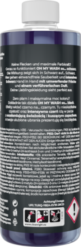 Tył butelki OH MY WASH! żel do prania czarnego 975 ml, ciemnoniebieska z białym korkiem i etykietą z tekstem.