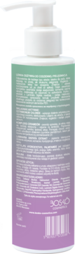 Tył butelki Bosko odżywki wygładzającej z pompką. Widoczne szczegóły produktu, składniki i zielono-fioletowa etykieta.