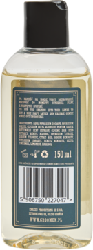 Tył szamponu do brody Groomen Earth, przezroczysta butelka 150 ml z czarną nakrętką i ciemnozieloną etykietą ze składnikami i kodem kreskowym.