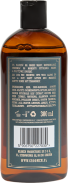 Tylna strona bursztynowej butelki męskiego szamponu Groomen Earth 300 ml, z niebieską etykietą, składem i kodem kreskowym.
