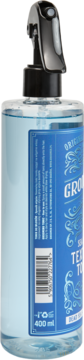 Groomen Sea Salt Texture Tonic, przezroczysta butelka z niebieskim płynem, widok z boku z kodem kreskowym i 400 ml.