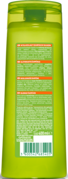 Tył zielonej butelki szamponu Garnier z białymi etykietami tekstowymi w wielu językach i kodem kreskowym, 400ml.