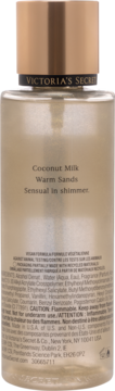 Tył mgiełki Victoria's Secret Coconut Milk Warm Sands, z opisem zapachu i składem, w butelce ze złotym korkiem.
