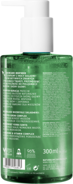 Tył zielonej butelki szamponu do włosów z białą pompką, widoczne etykiety, 96% składników naturalnych i '300ml'.