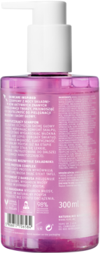 Tył różowej butelki szamponu 300ml z pompką, widoczne szczegóły składników i oznaczenia wegańskie.