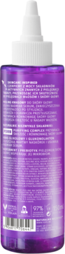 Tył fioletowej butelki peelingującego TREAT my hair do wrażliwej skóry głowy, biały aplikator, czytelny tekst.