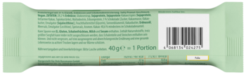 Tył jasnozielonego opakowania batonika, z kodem kreskowym i informacjami o składzie produktu.