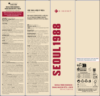 Rozłożone opakowanie esencji K-Secret Seoul 1988 Snail Mucin 97% + Rice, beżowe z czerwonym napisem.