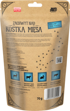 Tył opakowania Trzypsy Deluxe Kostka Mięsa kaczka 70g. Brązowa torebka ze szlakiem z łapek i ikonami smaków.