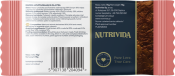 Tył batona proteinowego Nutri Bar z jagnięciną. Widoczne informacje o produkcie, barcode i logo Nutrivida na granatowym tle.