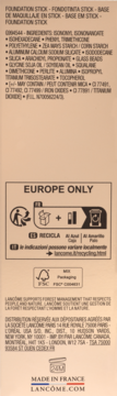 Tył opakowania podkładu w sztyfcie Lancôme Teint Idole, dolna część z listą składników, symbolami recyklingu i 'Made in France'.
