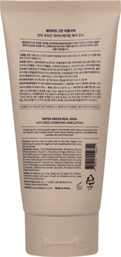 Tył beżowej tubki Rated Green REAL SHEA Anti-Frizz Hydrating Hair Lotion, z widoczną listą składników.