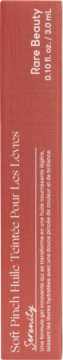 Rare Beauty Soft Pinch Tinted Lip Oil, Serenity, peach box, side view, vertical text describing hydrating formula.