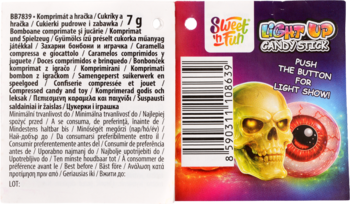 Tył opakowania Slam-dunk 2 Fun, cukierki pudrowe i zabawka. Grafika żółtej czaszki, czerwonego oka, kod kreskowy.