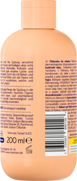 Tył brzoskwiniowej butelki odżywki do włosów 200 ml, z niemieckim opisem, listą składników i kodem kreskowym.