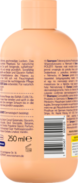 Tył brzoskwiniowej butelki szamponu ISANA Curlta z etykietą, składem, kodem kreskowym i objętością 250ml.