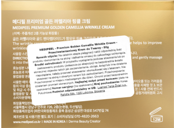 Tył złotego opakowania kremu Medi-Peel Premium Golden Camellia Wrinkle Cream z białą naklejką i polskim opisem.