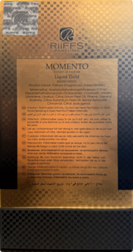 Tył złotego opakowania perfum Riiffs Momento Liquid Gold z czarnymi napisami i hologramem.