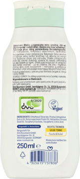 Tył białej butelki oliwki Babydream Extra Sensitive 250ml z etykietą, składem, kodem kreskowym i logo Vegan.