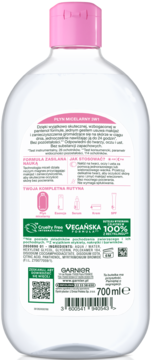 Tył białej butelki Garnier Hipoalergicznego Płynu Micelarnego 3w1 700ml, różowa zakrętka, etykieta z napisem 'Wegańska Formuła'.